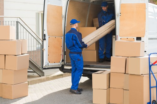Flat removals team managing access in Hornchurch apartment building