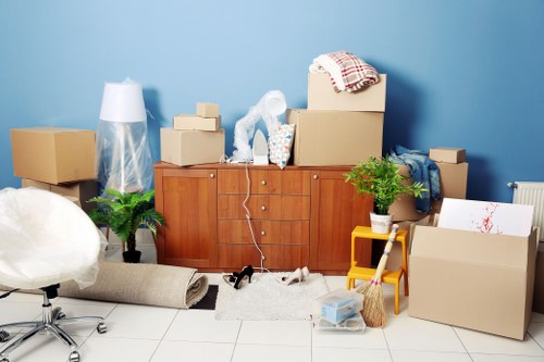 Furniture pick-up service removing a sofa in Hornchurch