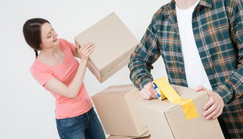 Removal truck and movers handling a local relocation in Hornchurch