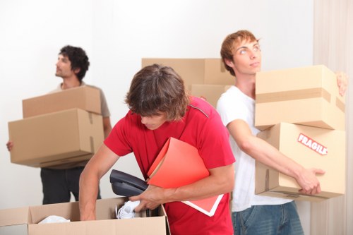 Relocation specialists organizing an office move schedule