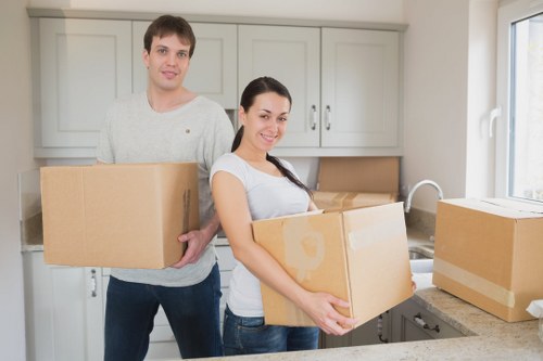 Packed moving boxes and furniture handling by Hornchurch removalists